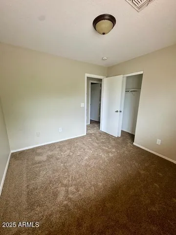 a bathroom with a sink a toilet and a shower