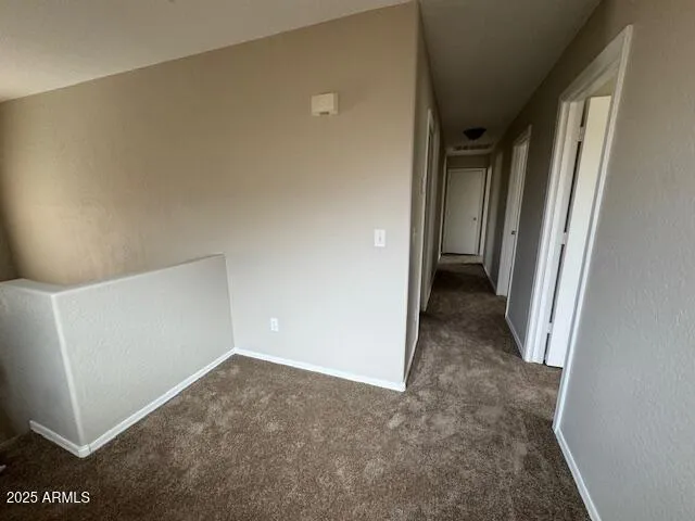 an empty room with a empty space and a window