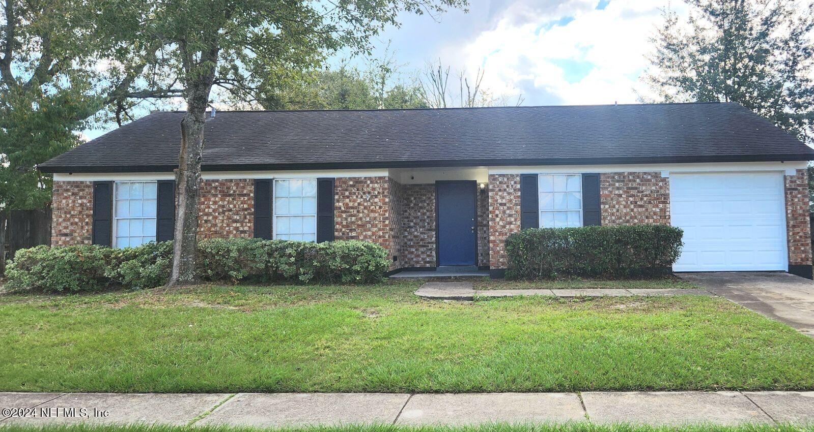 8150 Spring Lake Road North Jacksonville, FL 32210 - Photo 1 of 15 Front of Home