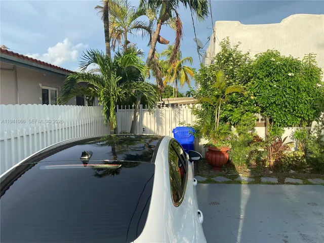 a view of swimming pool with a patio