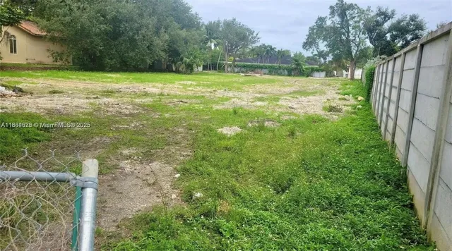 a view of a yard with an outdoor space