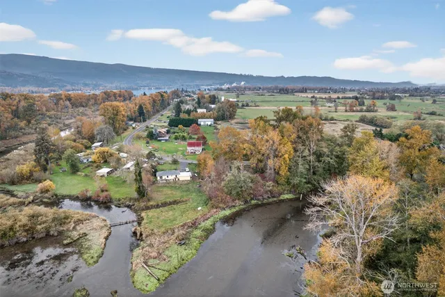 a view of a city with mountains in the background