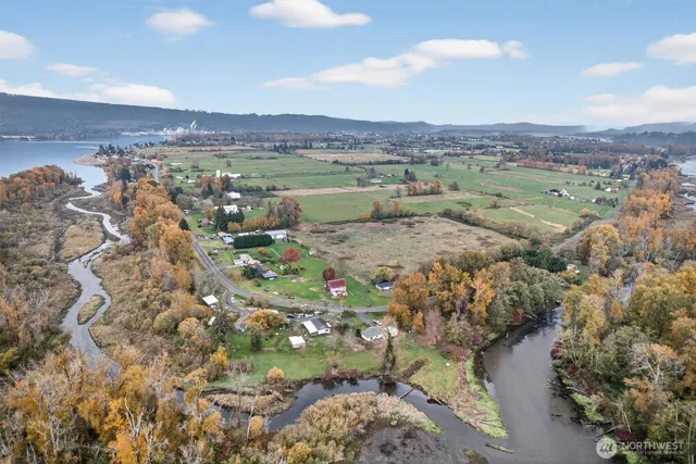 a view of a city with mountains in the background