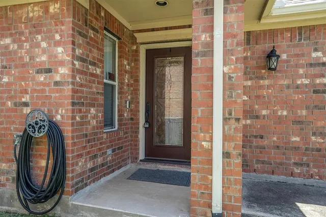 a view of a door with a door and a shower