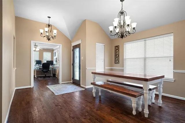 a very nice looking room with wooden floor