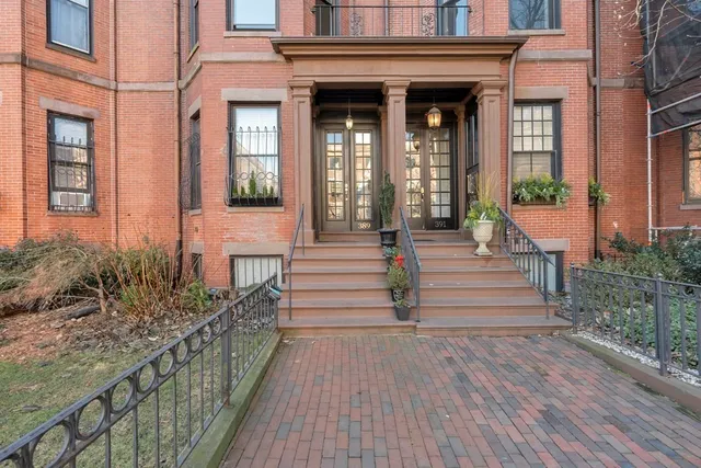 a front view of a house with a porch
