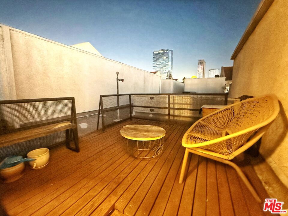 1118 Valencia Street, Unit 320 Los Angeles, CA 90015 - Photo 15 of 24 a bathroom with a sink and a mirror