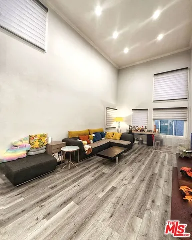 a bed room with furniture and a window