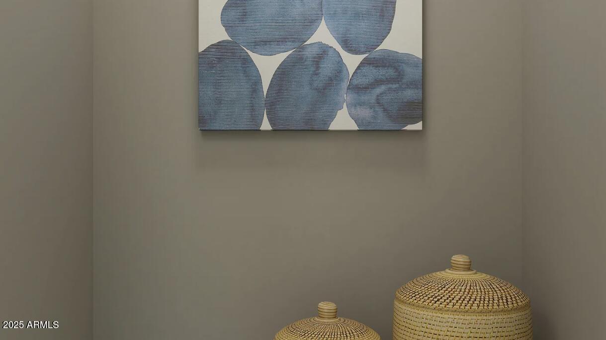 9552 West Piccadilly Road Phoenix, AZ 85037 - Photo 16 of 19 a bathroom with a toilet and a sink
