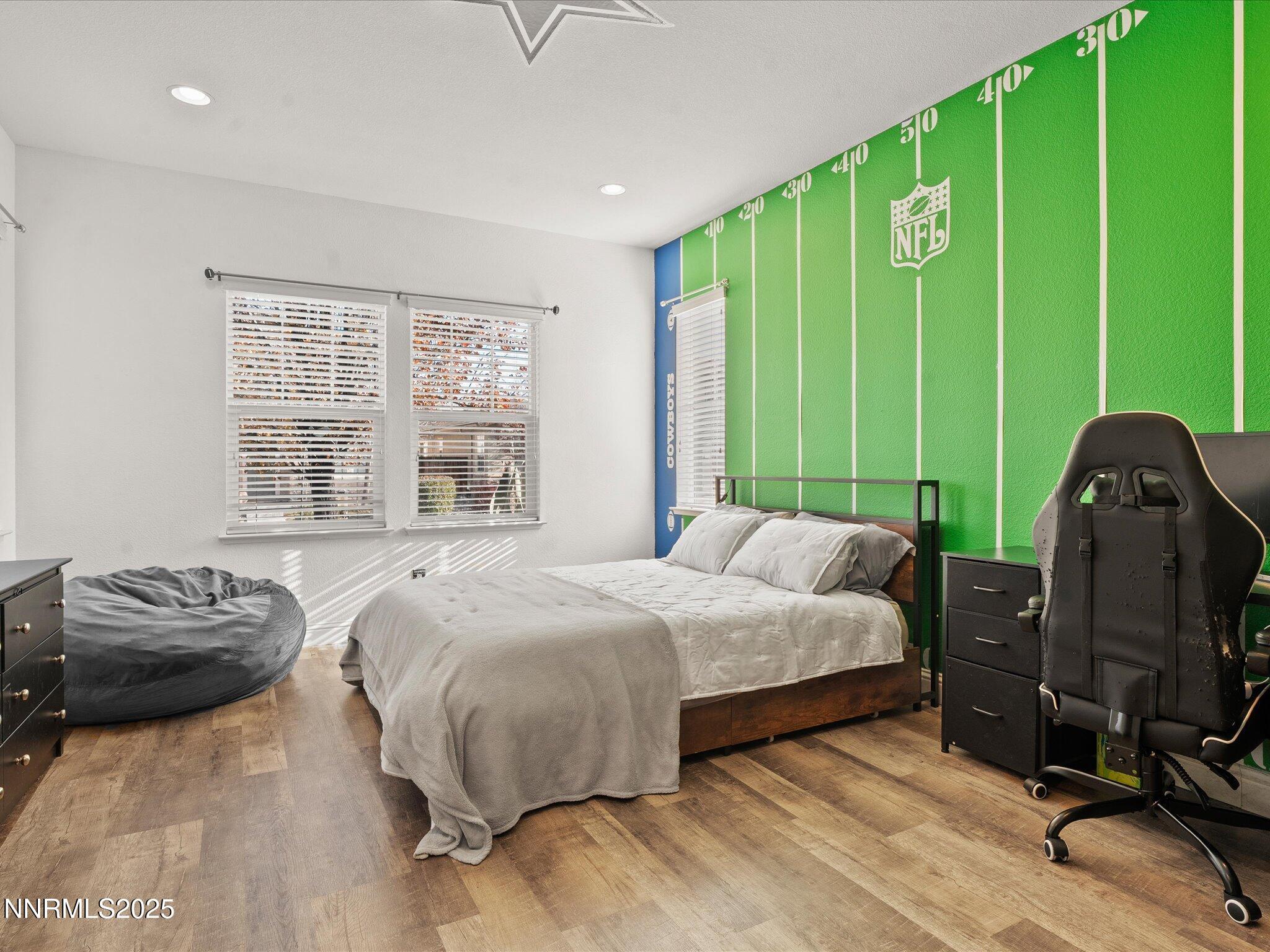 2135 Horse Prairie Road Reno, NV 89521 - Photo 5 of 32 a bedroom with a bed and a chair