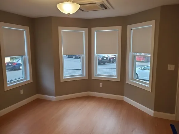 an empty room with windows