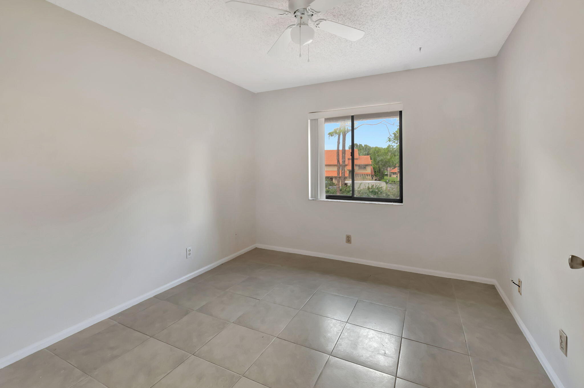 5750 Coach House Circle, Unit E Boca Raton, FL 33486 - Photo 30 of 44 SECOND BEDROOM