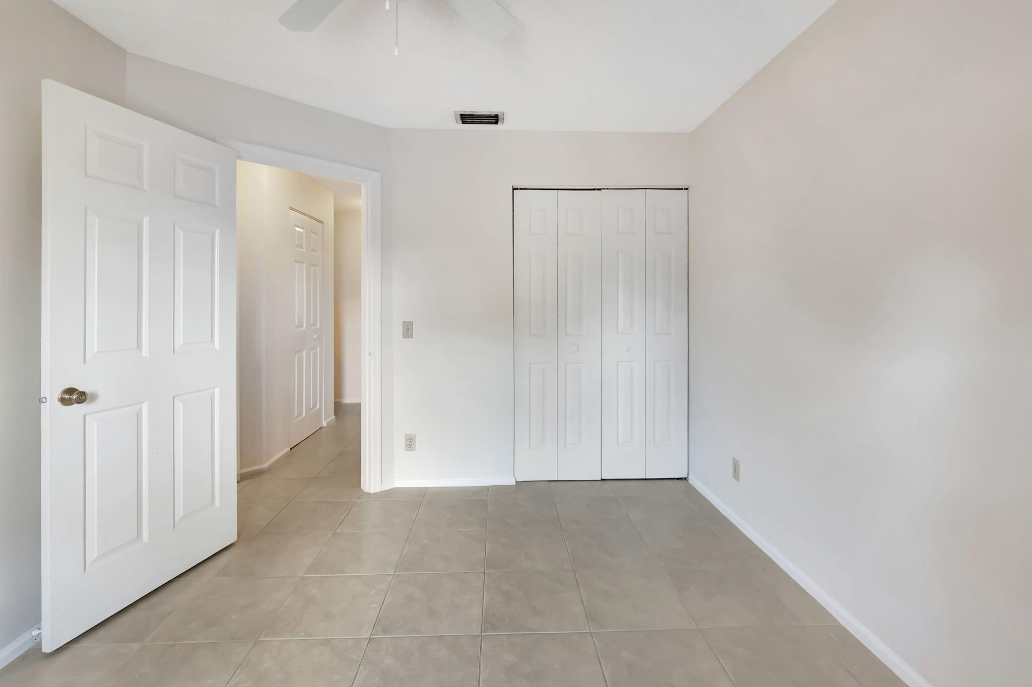 5750 Coach House Circle, Unit E Boca Raton, FL 33486 - Photo 31 of 44 SECOND BEDROOM