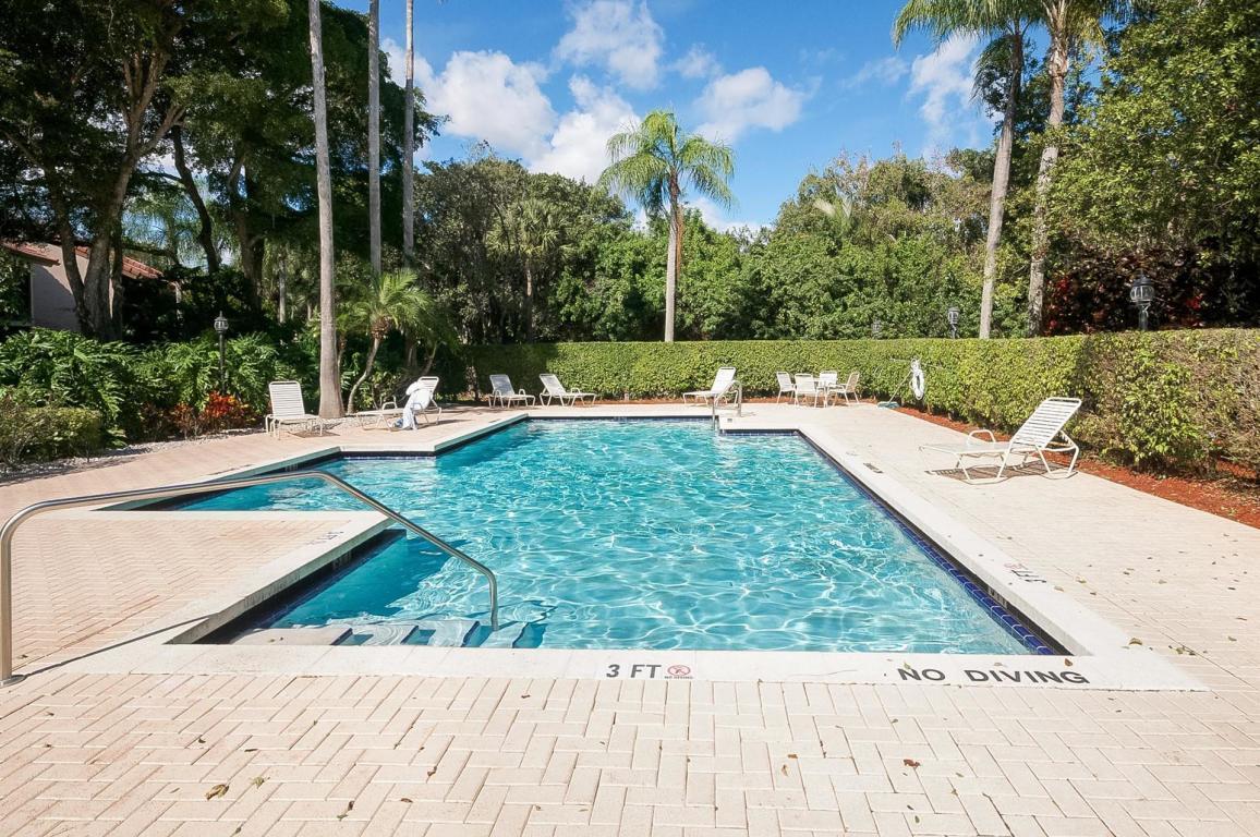 5750 Coach House Circle, Unit E Boca Raton, FL 33486 - Photo 44 of 44 ONE OF TWO HEATED POOLS