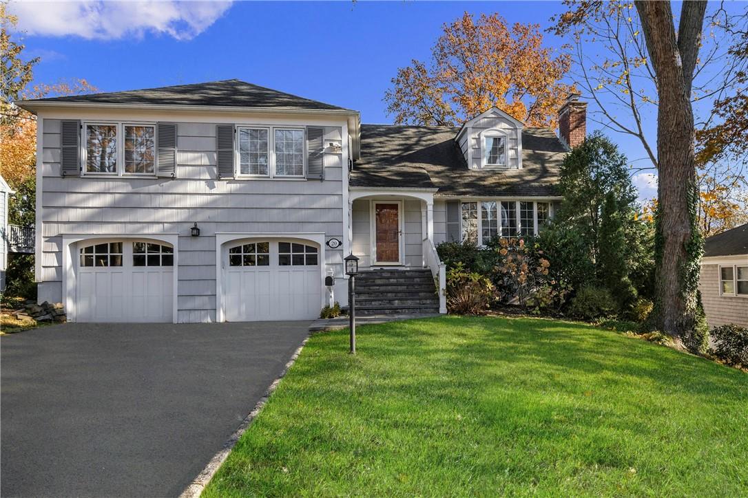 20 Colby Avenue Rye, NY 10580 - Photo 1 of 1 a front view of house with yard and green space