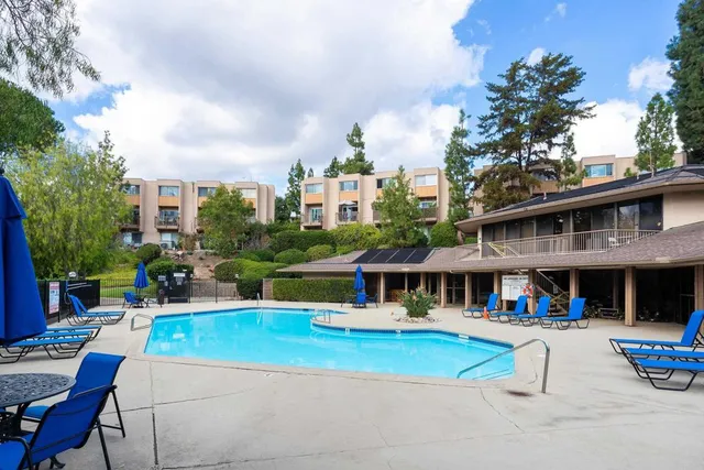 a view of pool with outdoor seating