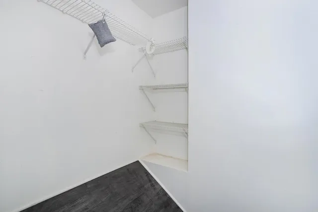 a view of a room with racks on the wall