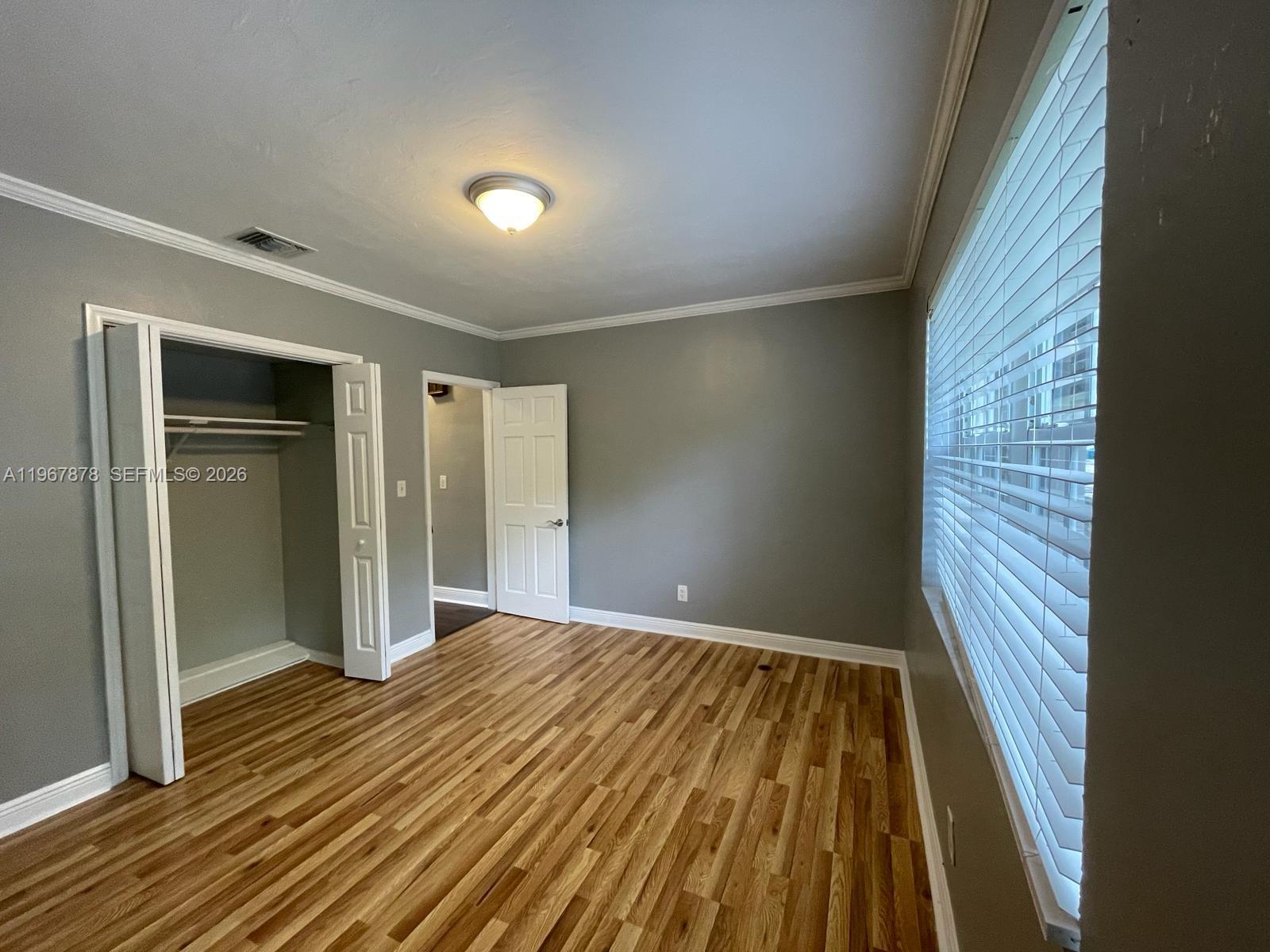 3350 Southwest 29th Street Miami, FL 33133 - Photo 9 of 15 a view of wooden floor in an empty room