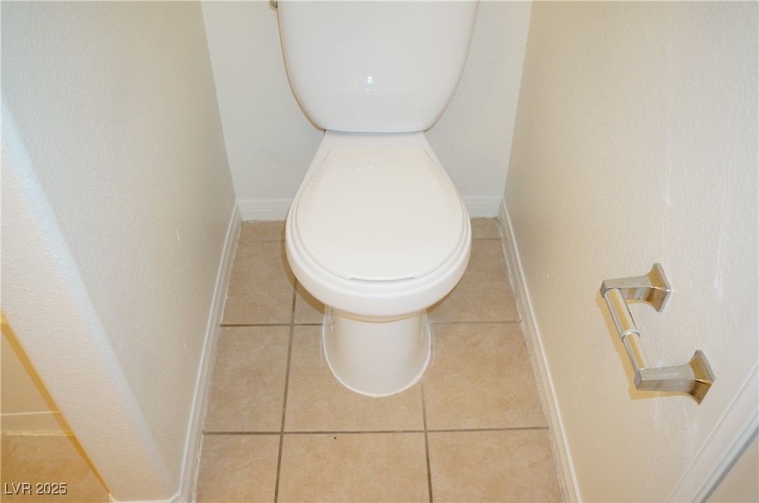 6148 Bluehill Avenue, Unit 2 Las Vegas, NV 89156 - Photo 10 of 13 Bathroom view of baseboards