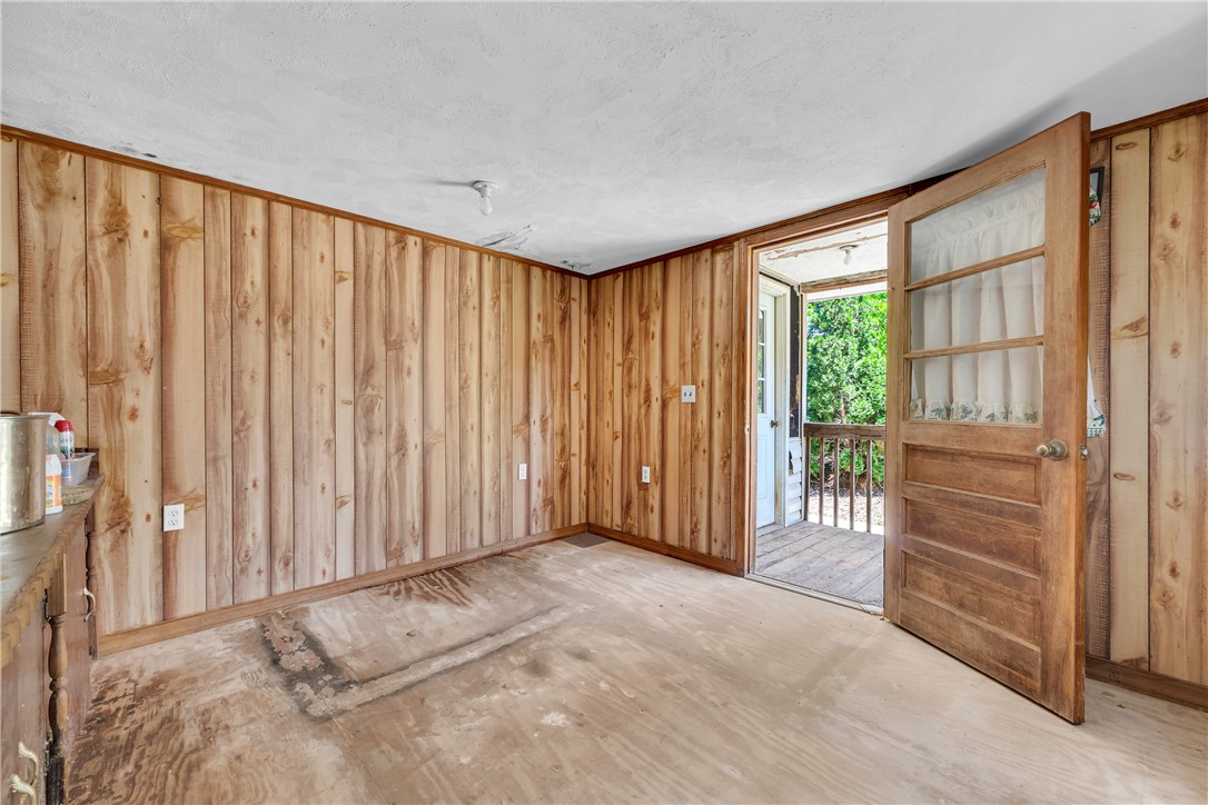 952 Stephens Drive Westminster, SC 29693 - Photo 42 of 50 Wood paneling with porch access.