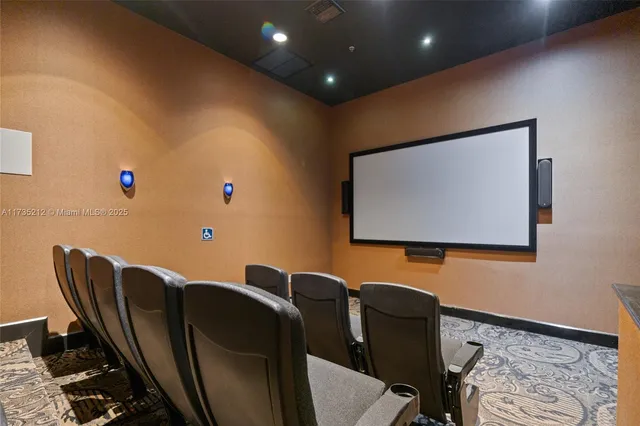a blue chair sitting next to a blue wall