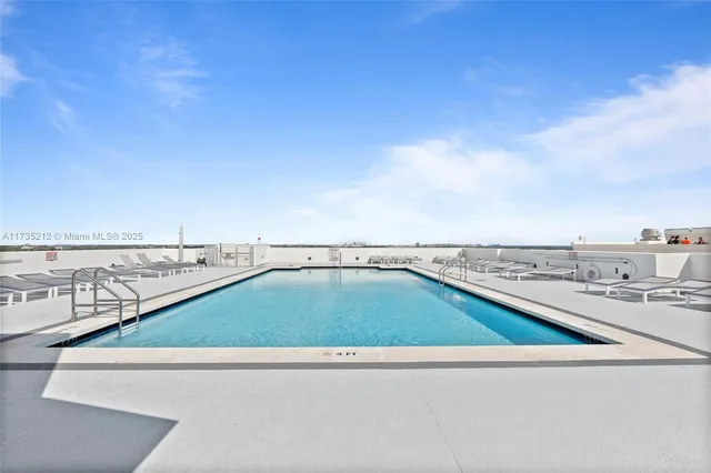 an outdoor space with wooden floor