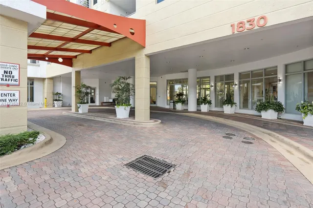 a view of a chairs and table in the patio