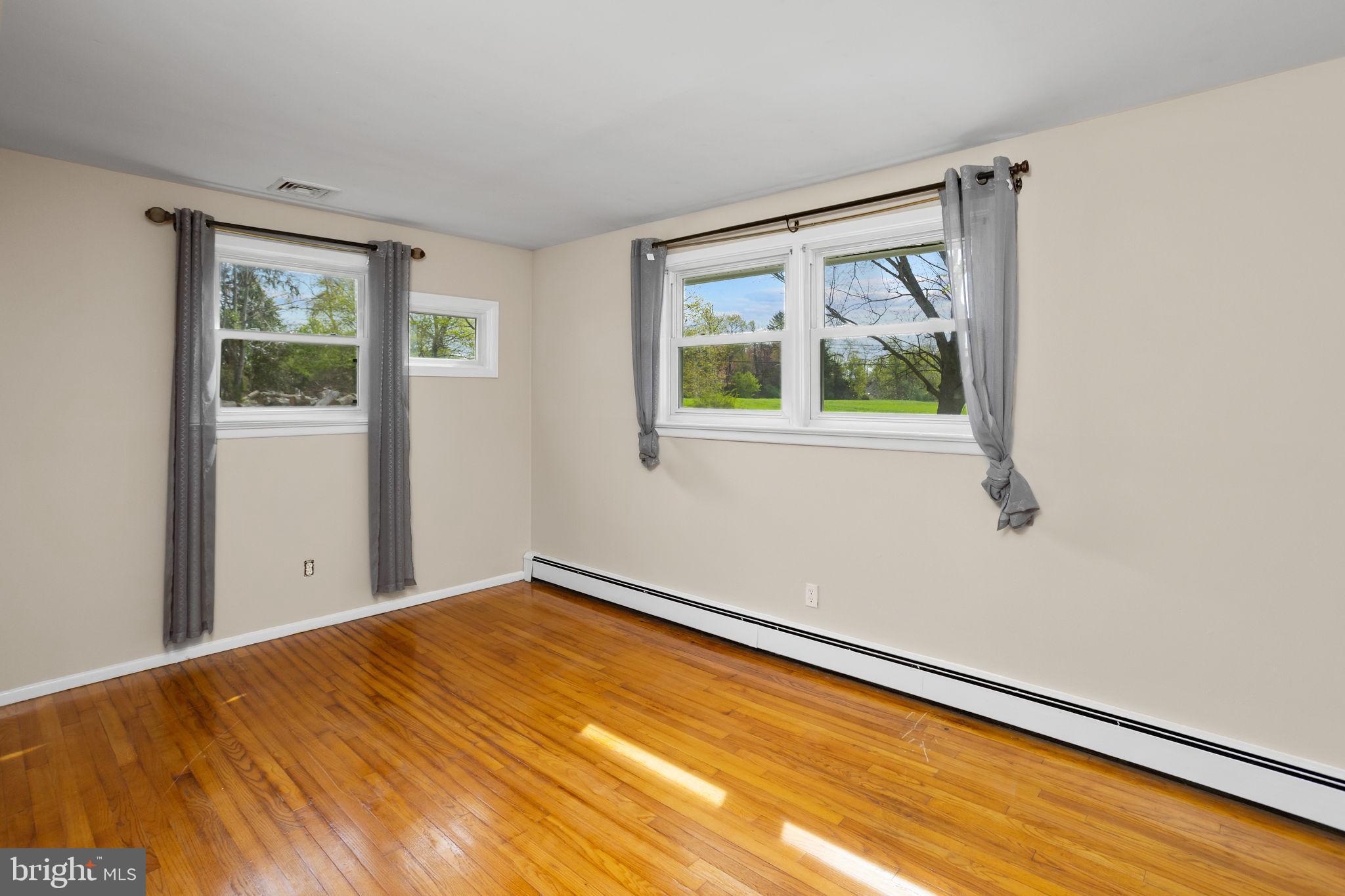 892 Monmouth Road Cream Ridge, NJ 08514 - Photo 13 of 24 a view of an empty room with a window