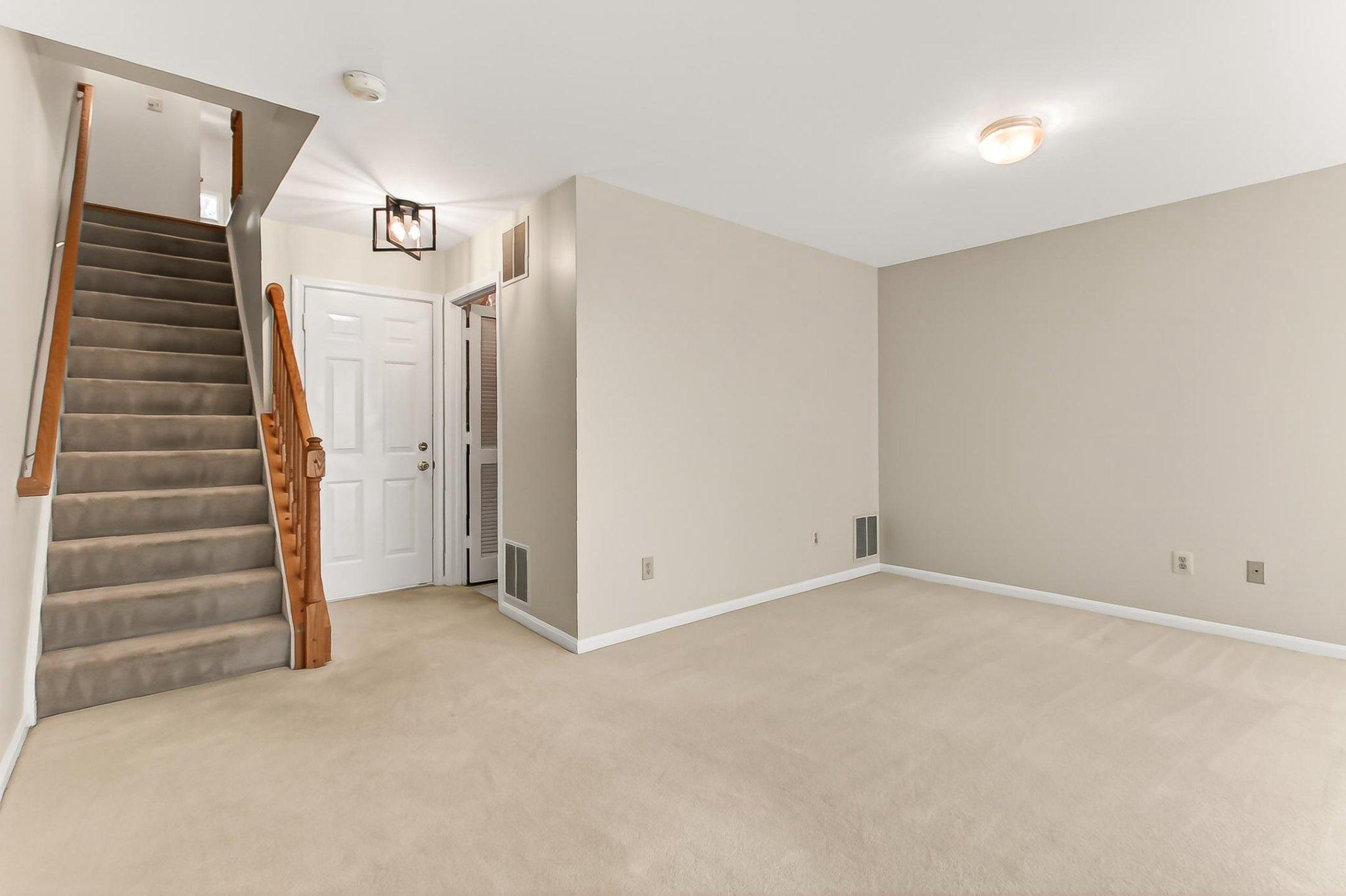 13157 Kidwell Field Road Herndon, VA 20171 - Photo 33 of 50 Lower Level rec room and garage entrance.