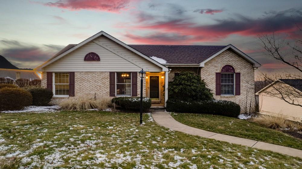 79 Windcrest Drive Cecil, PA 15321 - Photo 1 of 19 a front view of a house with a yard