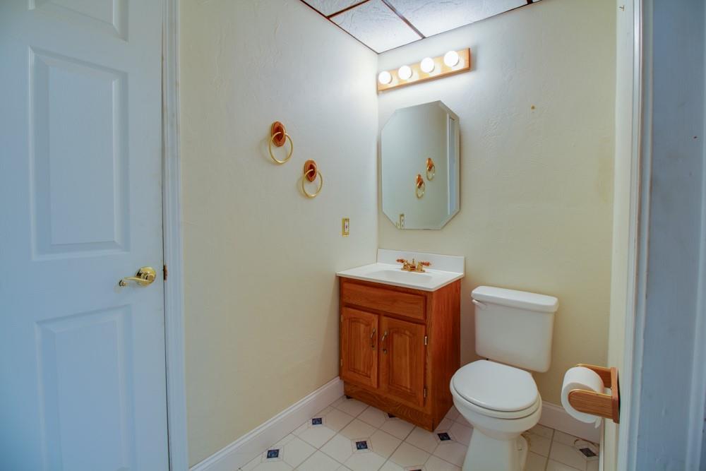 79 Windcrest Drive Cecil, PA 15321 - Photo 14 of 19 a bathroom with a sink mirror vanity and toilet