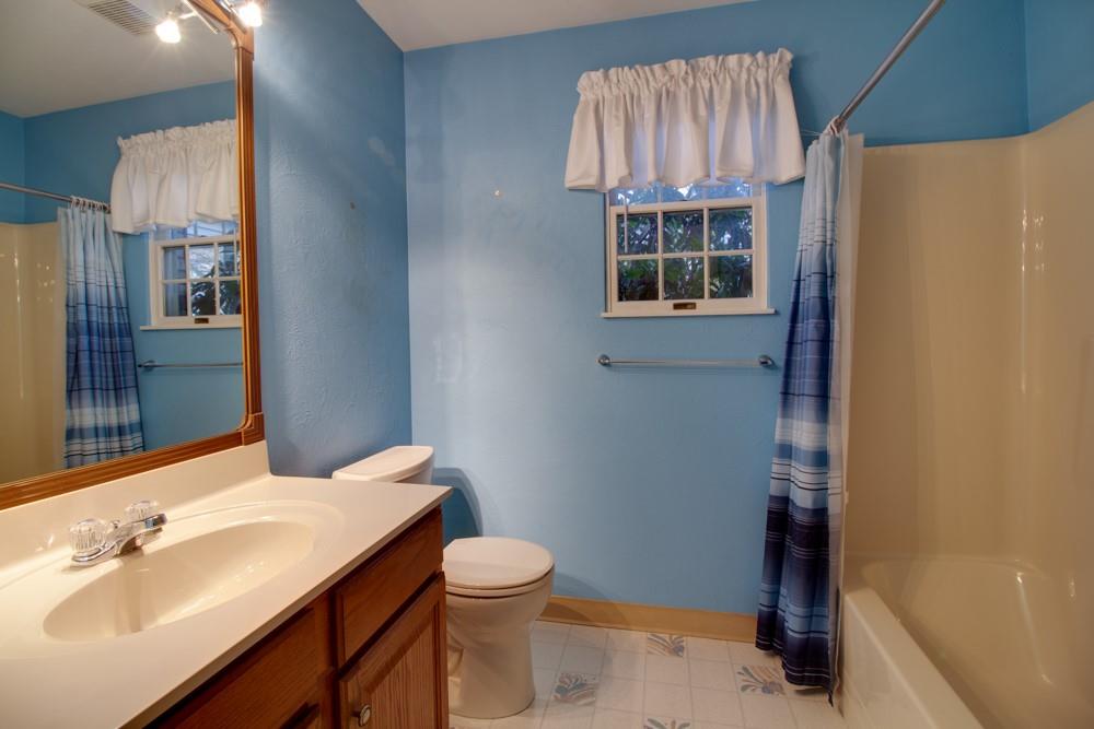 79 Windcrest Drive Cecil, PA 15321 - Photo 7 of 19 a bathroom with a sink a toilet and shower