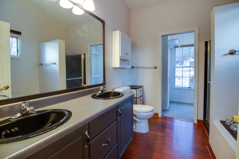 79 Windcrest Drive Cecil, PA 15321 - Photo 10 of 19 a bathroom with a sink and a large mirror