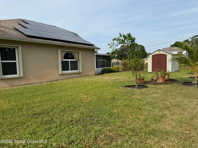 a house view with a garden space