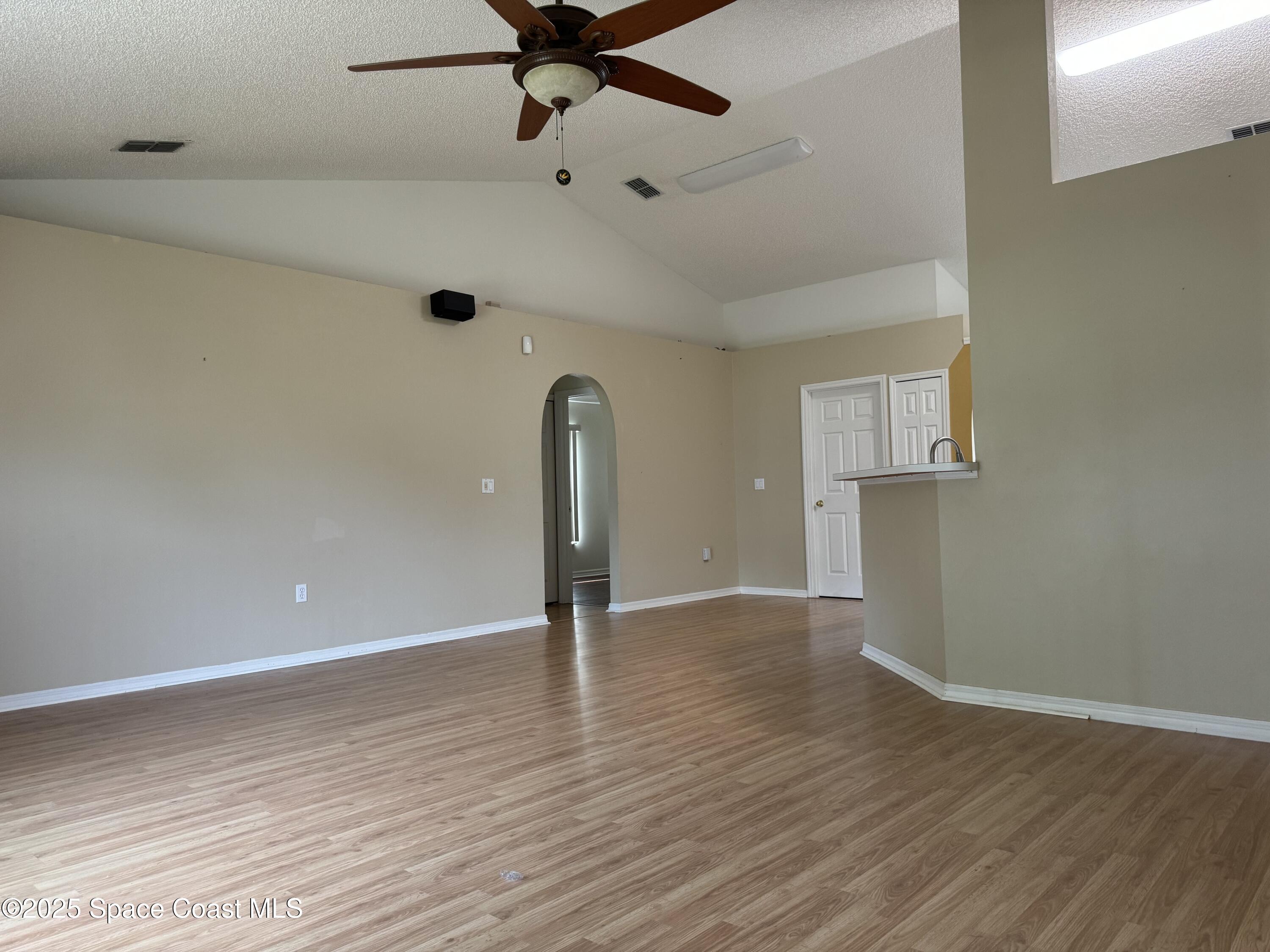 Undisclosed Address Palm Bay, FL 32909 - Photo 8 of 20 a view of an empty room with a window