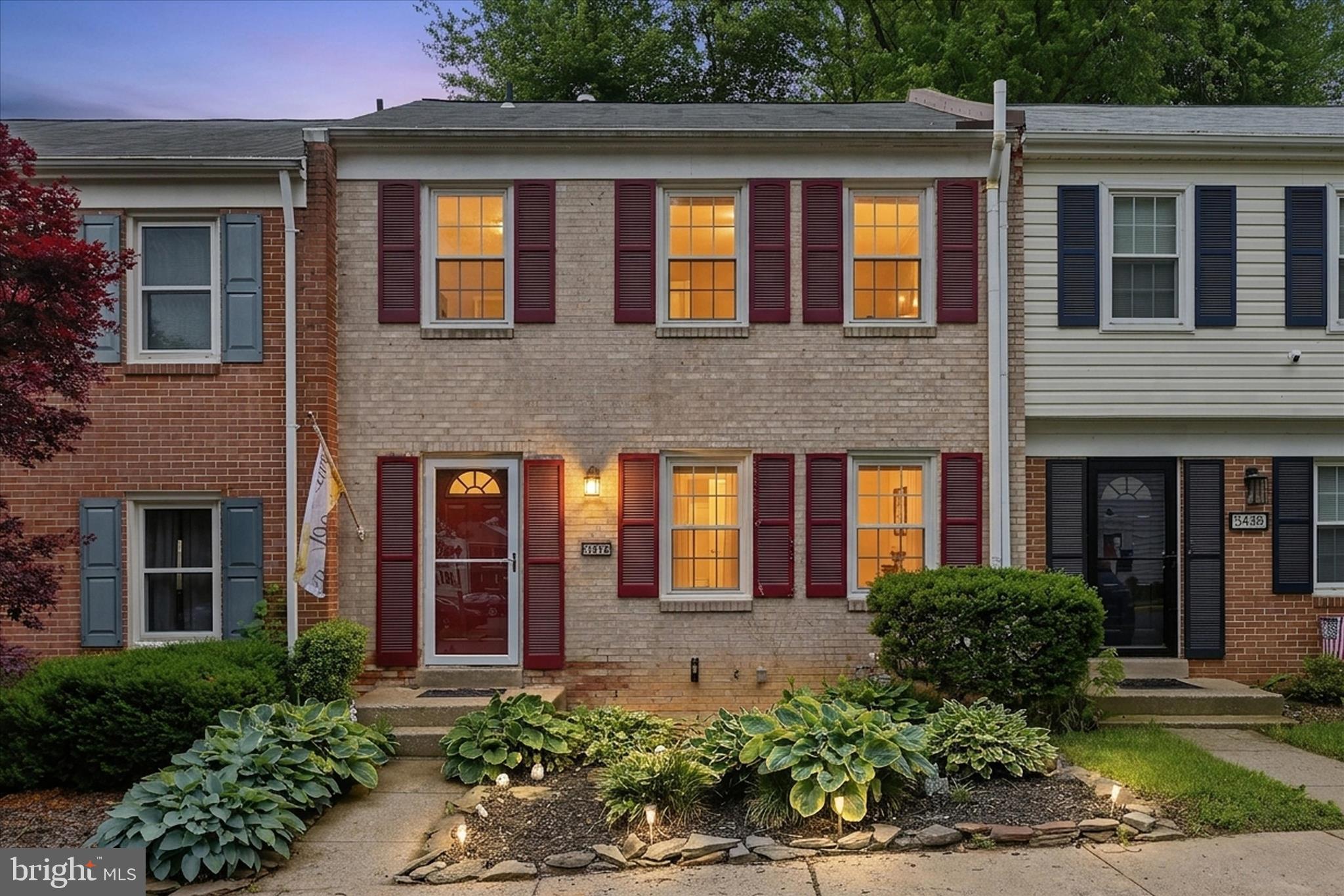 5446 Lighthouse Lane Burke, VA 22015 - Photo 1 of 36 front view of a brick house many windows