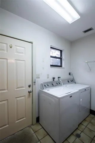 a view of bathroom with dual sinks