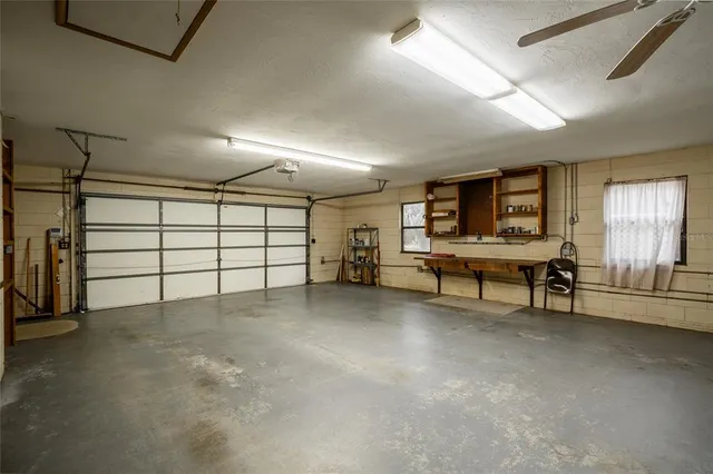 a view of a livingroom with furniture and a window