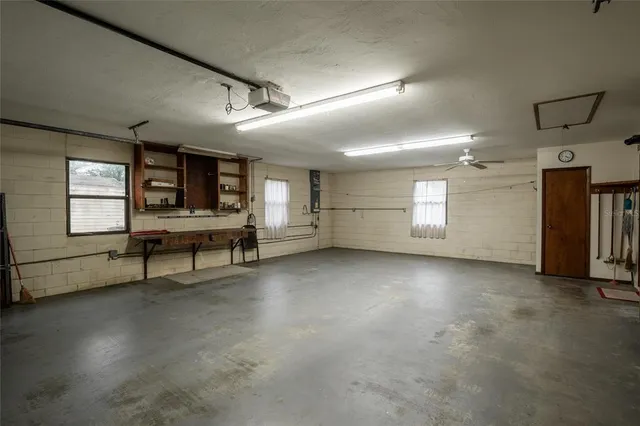 a view of a livingroom with furniture and windows