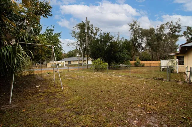 a backyard of water with palm trees