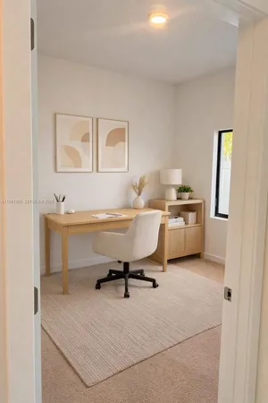 a room with furniture a air conditioner and a table