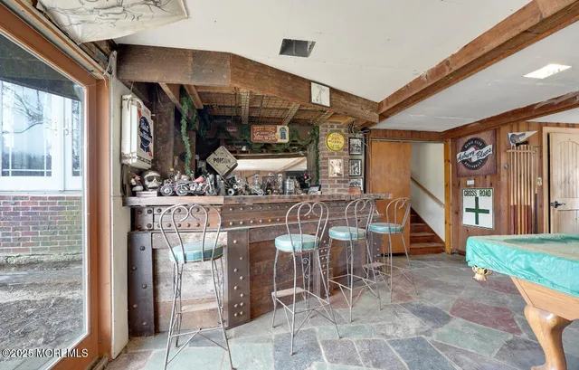 a room filled with furniture and a table