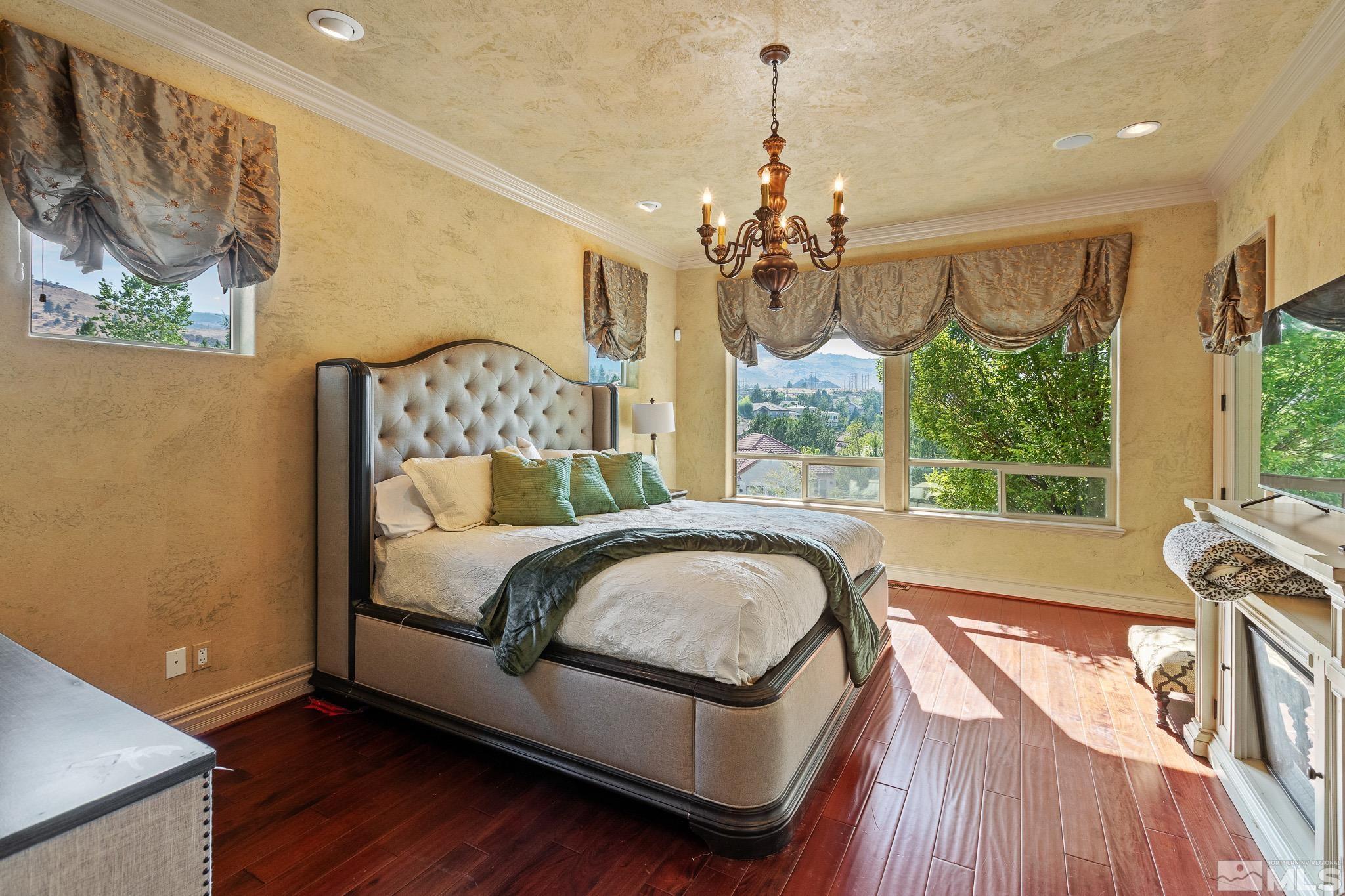 4885 Mountainshyre Road Reno, NV 89519 - Photo 17 of 39 a bedroom with a bed dresser and a window
