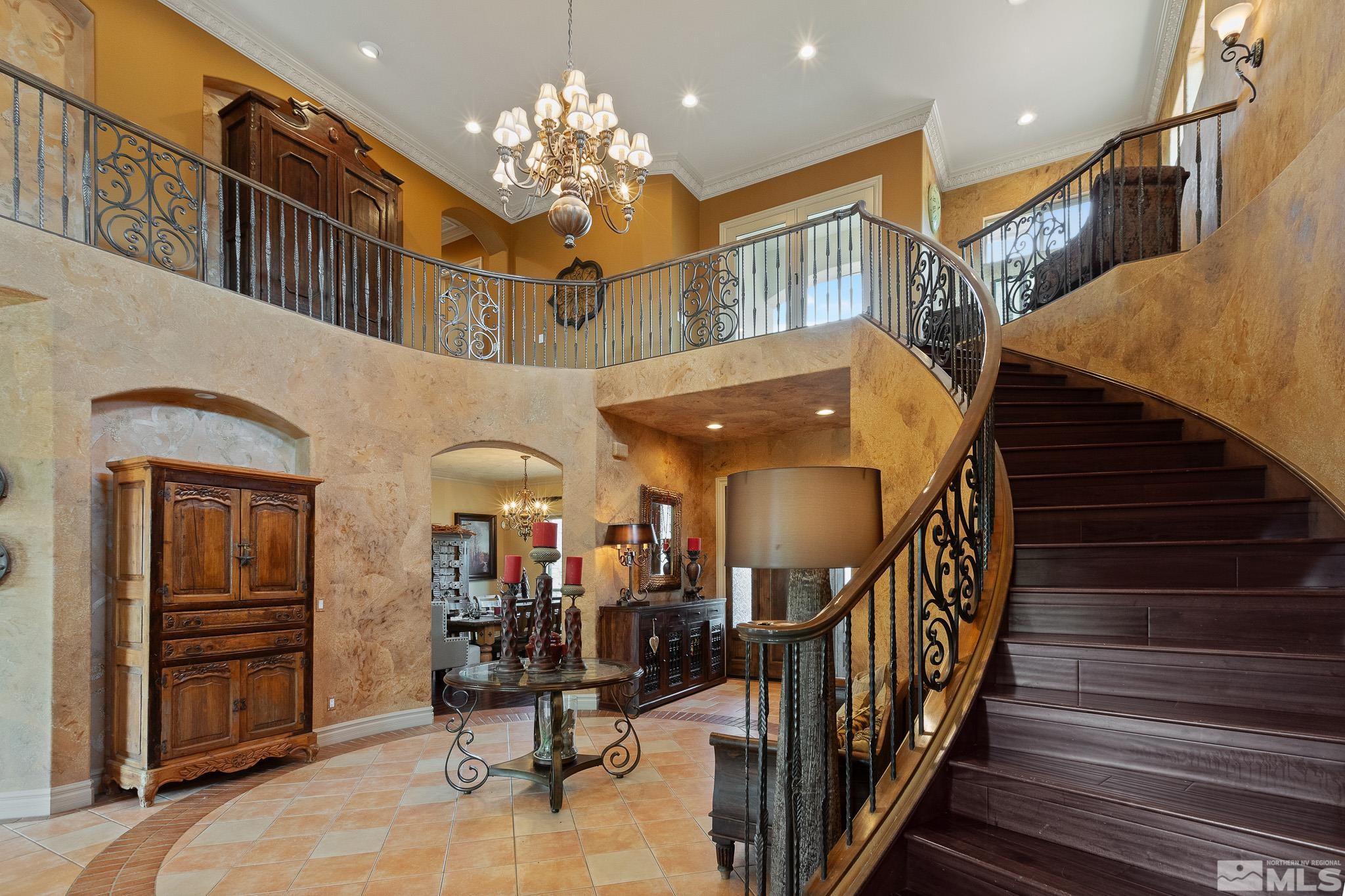 4885 Mountainshyre Road Reno, NV 89519 - Photo 23 of 39 a view of a hallway with a livingroom with furniture and stairs