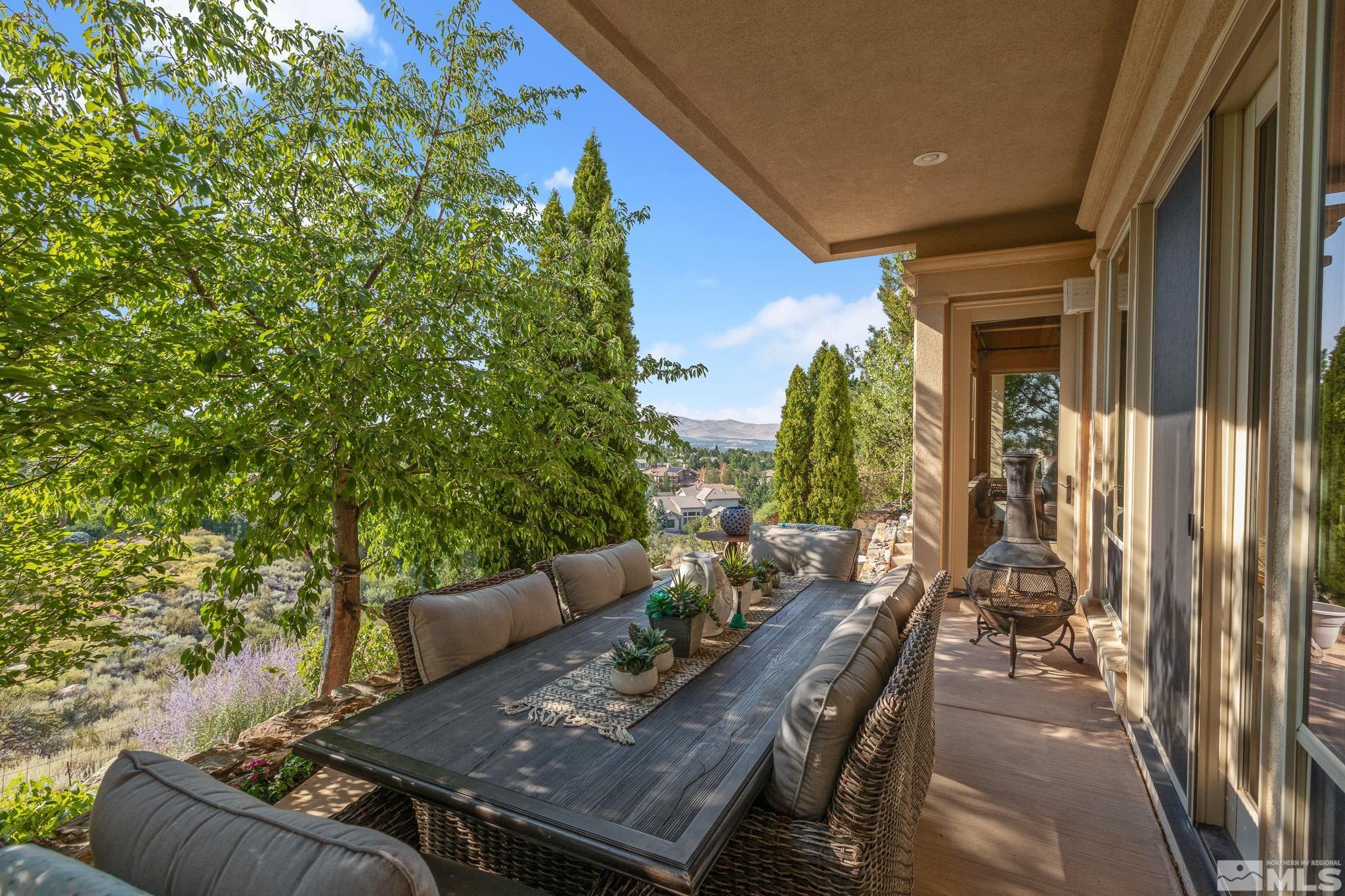 4885 Mountainshyre Road Reno, NV 89519 - Photo 34 of 39 a view of a patio with table and chairs and potted plants