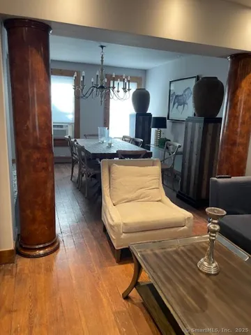 a stove top oven sitting inside of a kitchen