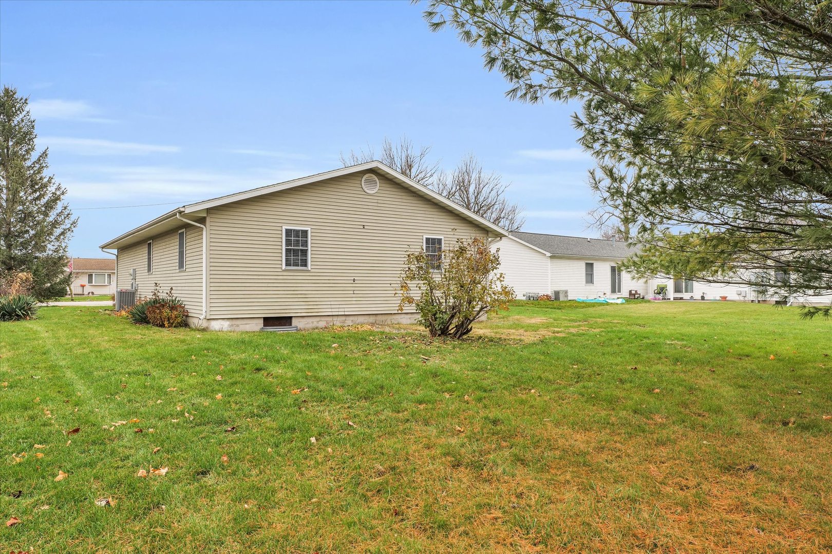 203 West Main Street Ogden, IL 61859 - Photo 25 of 27 a view of a house with a yard