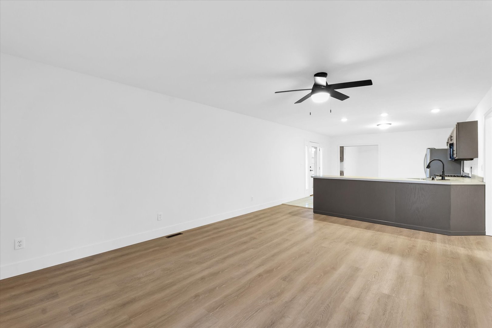 203 West Main Street Ogden, IL 61859 - Photo 5 of 27 a view of kitchen with microwave and sink
