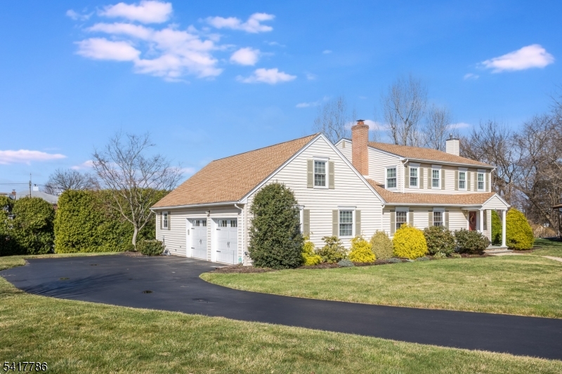 10 Torlish Gate Raritan, NJ 08869 - Photo 2 of 40 a front view of a house with a yard