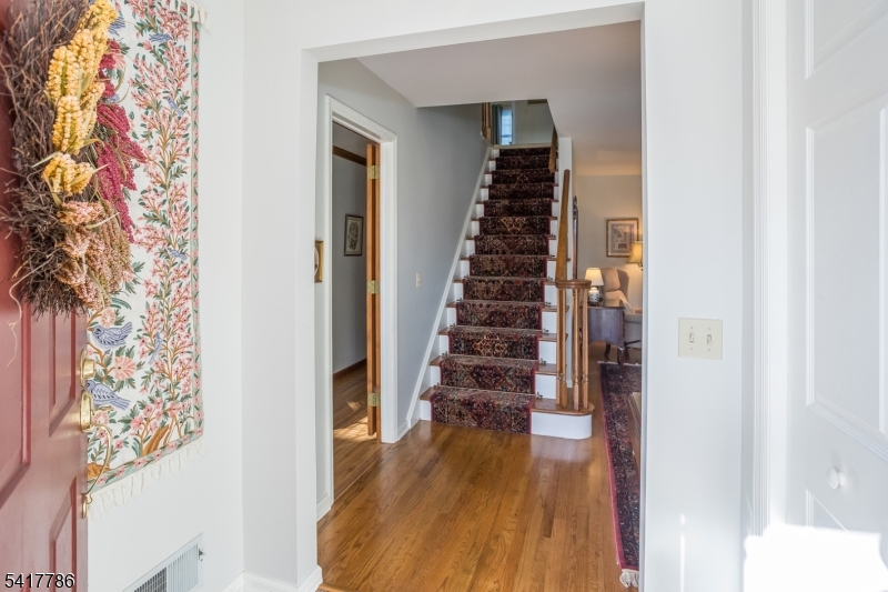 10 Torlish Gate Raritan, NJ 08869 - Photo 3 of 40 a view of entryway with wooden floor